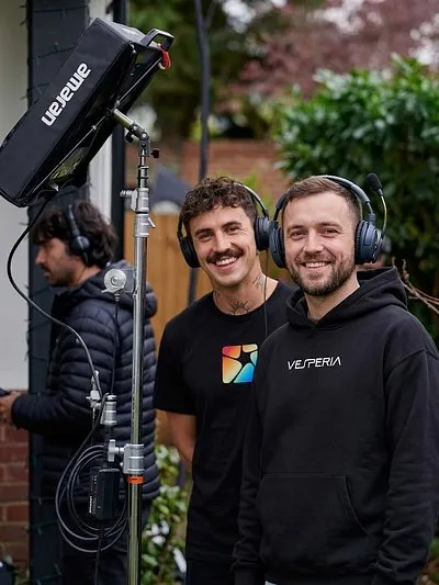 Crew on set wearing Vesperia tees and hoodies